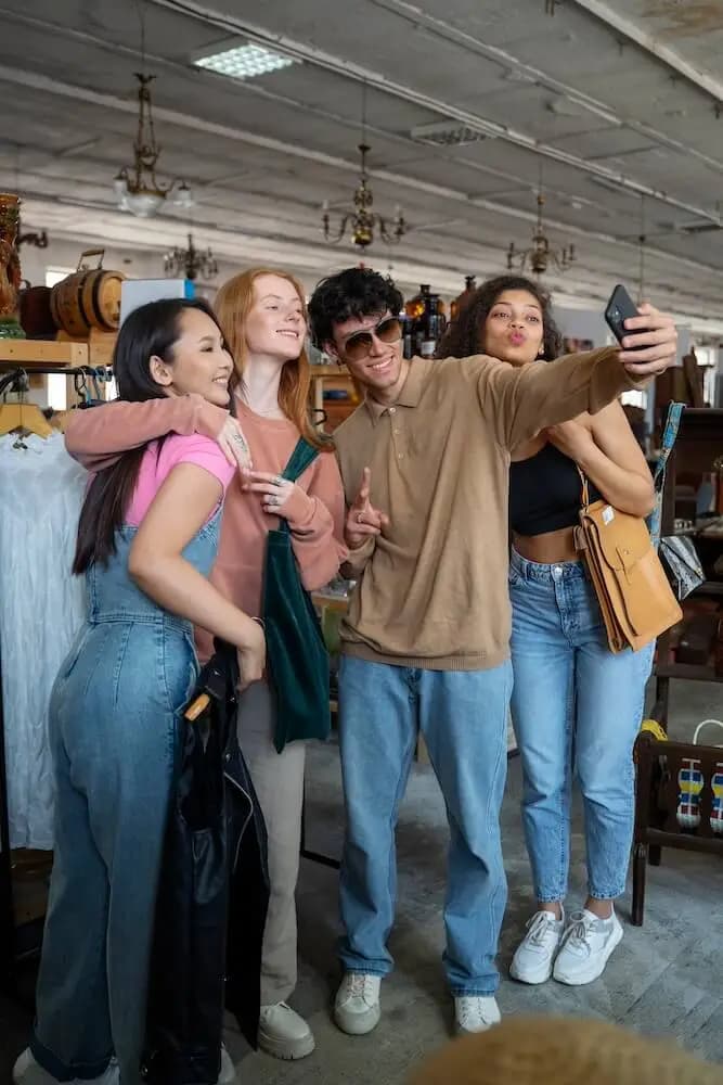 person who is recording themselves with a camera presenting something.